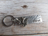 Cheerleading Keychain- with name of your choice or "cheer" with cheer charm- Keychain- Small, Textured, Rectangle Key Chain