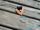 Leather and Mixed Metal Statement Necklace: Black, Copper, and Silver Pendant