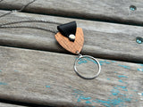 Leather and Mixed Metal Statement Necklace: Black, Copper, and Silver Pendant