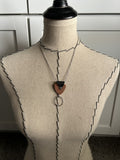Leather and Mixed Metal Statement Necklace: Black, Copper, and Silver Pendant