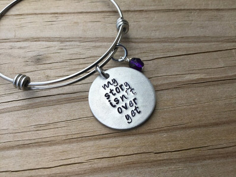 Quote Bracelet- "my story isn't over yet" with an accent bead of your choice
