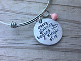Quote Bracelet- "every journey begins with a single step" with an accent bead of your choice