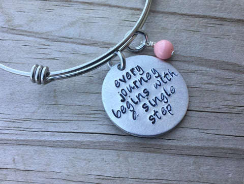 Quote Bracelet- "every journey begins with a single step" with an accent bead of your choice