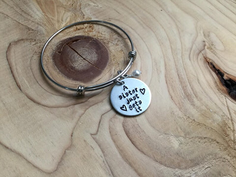 Quote Bracelet- "A sister just gets it" with an accent bead of your choice