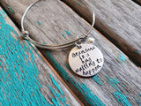 Quote Bracelet- "Grandma is a hug waiting to happen" with an accent bead of your choice