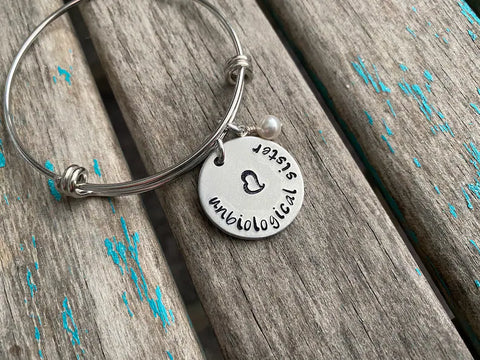 Quote Bracelet- "unbiological sister" with an accent bead of your choice