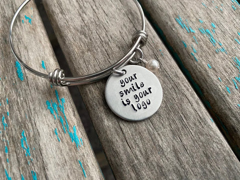 Quote Bracelet- "your smile is your logo" with an accent bead of your choice