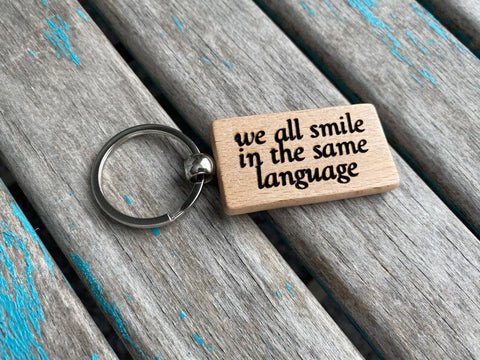 Quote Keychain- "we all smile in the same language" -Wood Keychain