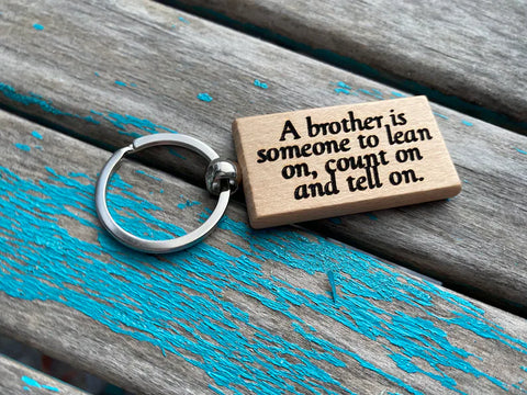 Quote Keychain- "A brother is someone to lean on, count on and tell on." -Wood Keychain