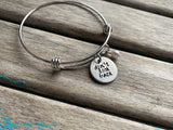 Hand-Stamped "don't look back" Bangle Bracelet with Accent Bead of your choice