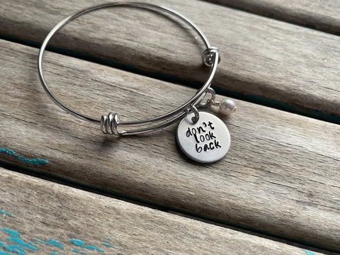 Hand-Stamped "don't look back" Bangle Bracelet with Accent Bead of your choice