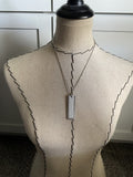 Textured White Leather and Silver Necklace: Modern Metal Pendant