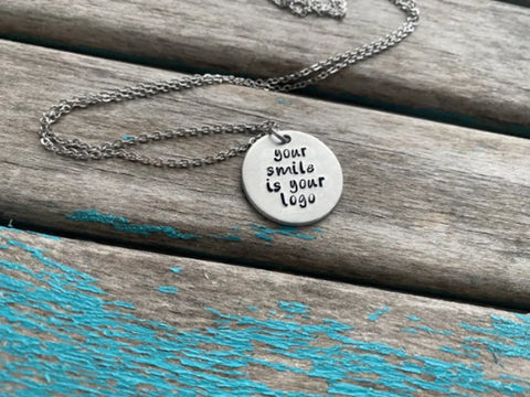 Inspirational Quote Necklace: "your smile is your logo"