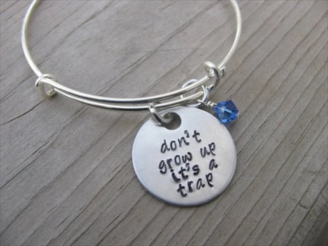 Quote Bracelet- "don't grow up it's a trap" with an accent bead of your choice