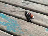Orange, Silver, and Black Cluster Drop Necklace