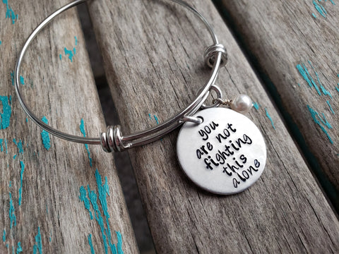 Quote Bracelet- "you are not fighting this alone" with an accent bead of your choice