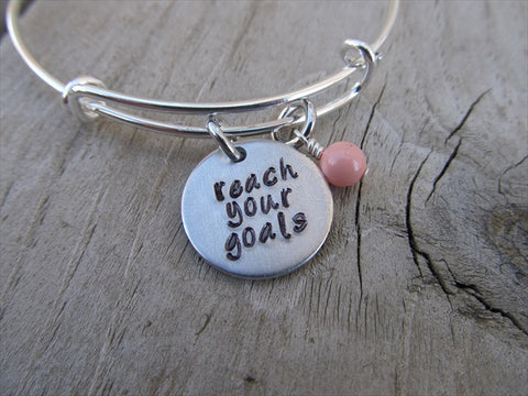 Reach Your Goals Bracelet- "reach your goals"  - Hand-Stamped Bracelet- Adjustable Bangle Bracelet with an accent bead of your choice