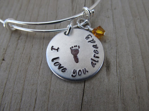 Expectant Mother Bracelet- "I love you already" with stamped baby foot- Hand-Stamped Bracelet  -Adjustable Bangle Bracelet with an accent bead of your choice