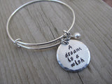 Dream Is A Wish Inspiration Bracelet- "A dream is a wish" - Hand-Stamped Bracelet- Adjustable Bangle Bracelet with an accent bead of your choice