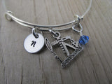 Oil Well Charm Bracelet- Adjustable Bangle Bracelet with an Initial Charm and an Accent Bead of your choice