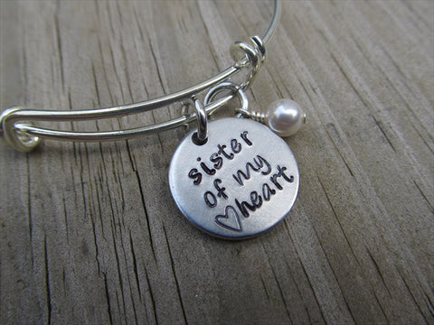 Friendship Bracelet- "sister of my heart" with stamped heart - Hand-Stamped Bracelet- Adjustable Bangle Bracelet with an accent bead of your choice