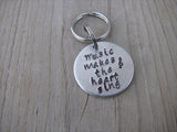 Small Hand-Stamped Keychain "Music makes the heart sing" with stamped treble clef- Small Circle Keychain - Hand Stamped Metal Keychain