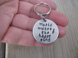 Small Hand-Stamped Keychain "Music makes the heart sing" with stamped treble clef- Small Circle Keychain - Hand Stamped Metal Keychain