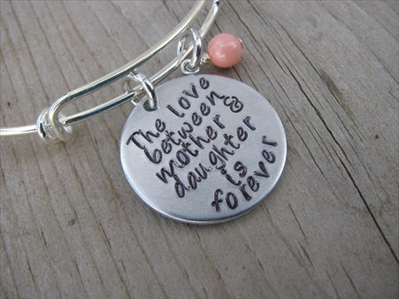 Mother's Bracelet- "The love between mother & daughter is forever" - Hand-Stamped Bracelet- Adjustable Bangle Bracelet with an accent bead in your choice of colors