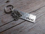 Cheerleading Keychain- with name of your choice or "cheer" with cheer charm- Keychain- Small, Textured, Rectangle Key Chain