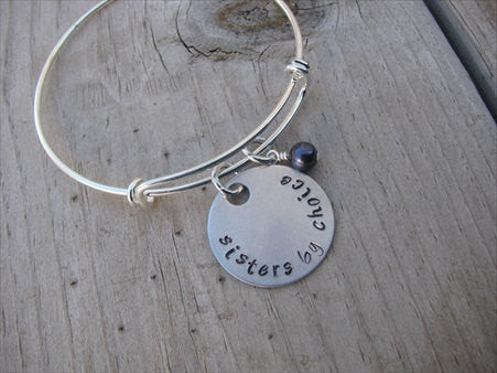 Sisters By Choice Bracelet- "sisters by choice" - Hand-Stamped Bracelet- Adjustable Bangle Bracelet with an accent bead of your choice