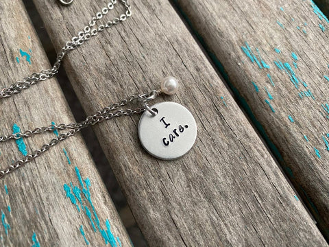 I Care Necklace- Hand-Stamped Necklace "I care." with an accent bead in your choice of colors