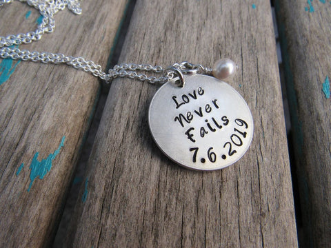 Love Never Fails Necklace - “Love Never Fails” with a date and accent bead of your choice