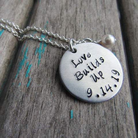 Love Builds Up Necklace “Love Builds Up” with a date and accent bead of your choice