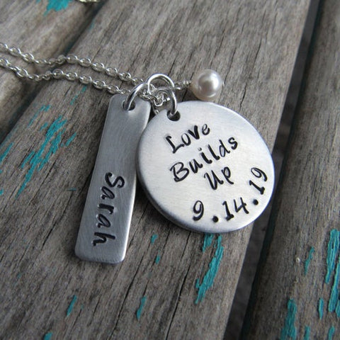 Love Builds Up Necklace- "Love Builds Up" with a date, name charm, and accent bead of your choice - Hand-Stamped Necklace