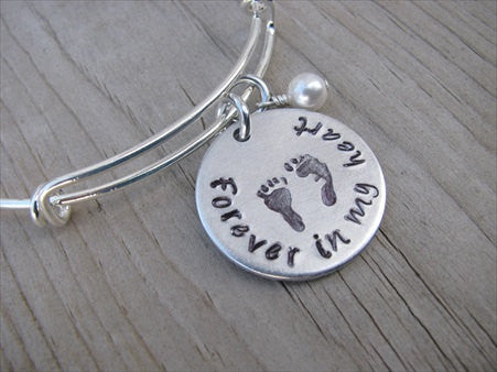 Baby Loss/Miscarriage Bracelet- Hand-stamped bracelet, "Forever in my heart" with stamped baby footprints   - Hand-Stamped Bracelet  -Adjustable Bangle Bracelet with an accent bead of your choice