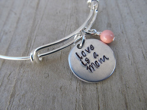 Love is a Mom Bracelet- "love is a Mom"  - Hand-Stamped Bracelet- Adjustable Bangle Bracelet with an accent bead in your choice of colors