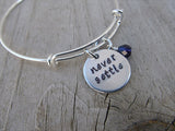 Never Settle Bracelet- "never settle"  - Hand-Stamped Bracelet- Adjustable Bangle Bracelet with an accent bead in your choice of colors
