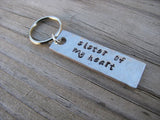 Sister Keychain - "sister of my heart" - Hand Stamped Metal Keychain- small, narrow keychain