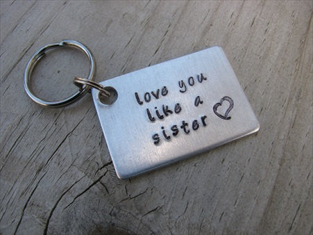 Friendship Keychain- "love you like a sister" with a heart - Hand Stamped Metal Keychain