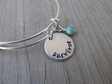 Survivor Bracelet- "survivor"  - Hand-Stamped Bracelet- Adjustable Bangle Bracelet with an accent bead of your choice