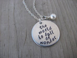 The World Is Full of Wonder Inspiration Necklace- "the world is full of wonder"  - Hand-Stamped Necklace with an accent bead in your choice of colors