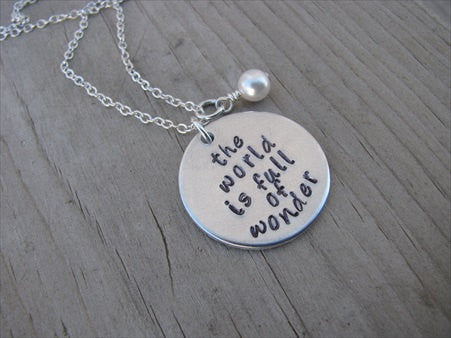 The World Is Full of Wonder Inspiration Necklace- "the world is full of wonder"  - Hand-Stamped Necklace with an accent bead in your choice of colors